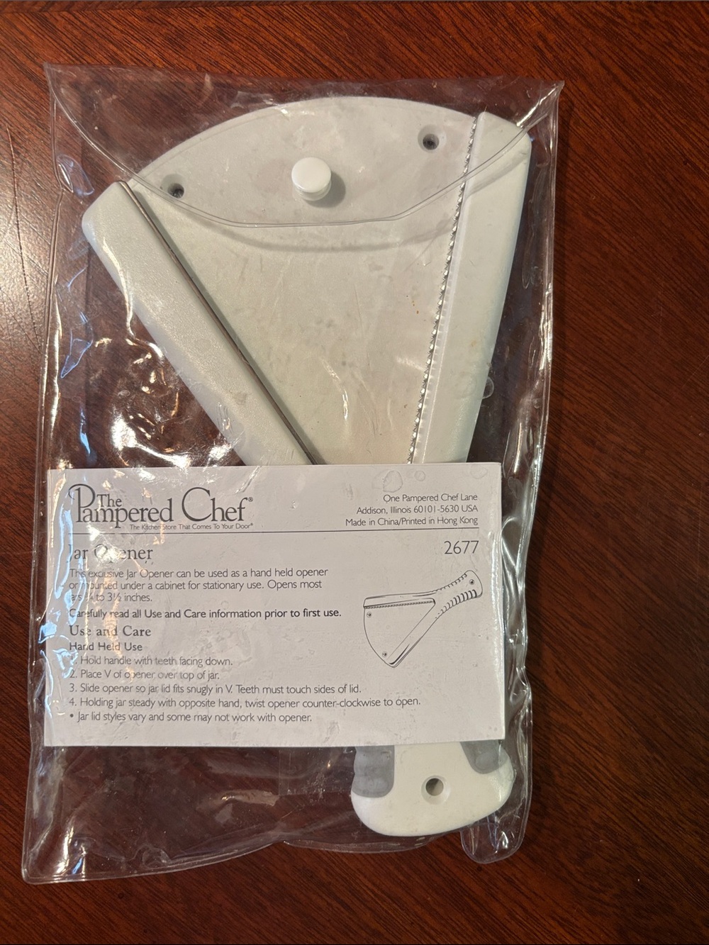 The Pampered Chef White Jar Opener - Handheld or Mountable